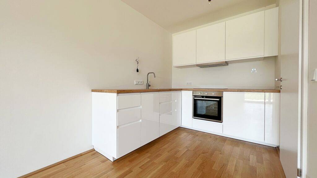 RESERVIERT! 2-Zimmer-Wohnung mit Garten und Tiefgaragenstellplatz in Waidmannsdorf.