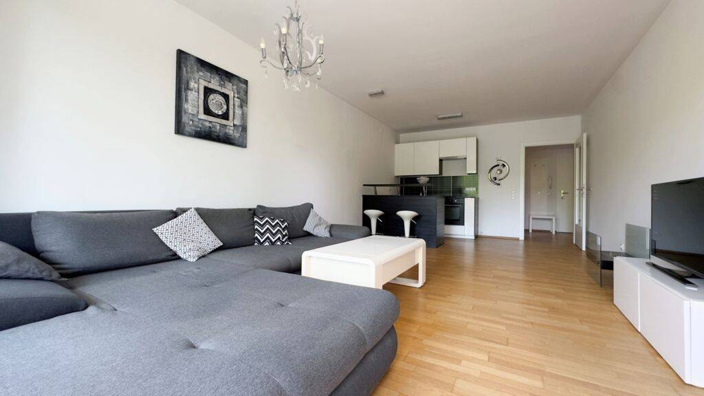 2-Zimmer-Wohnung mit Südterrasse und Tiefgaragenstellplatz in der Koschatstraße.
