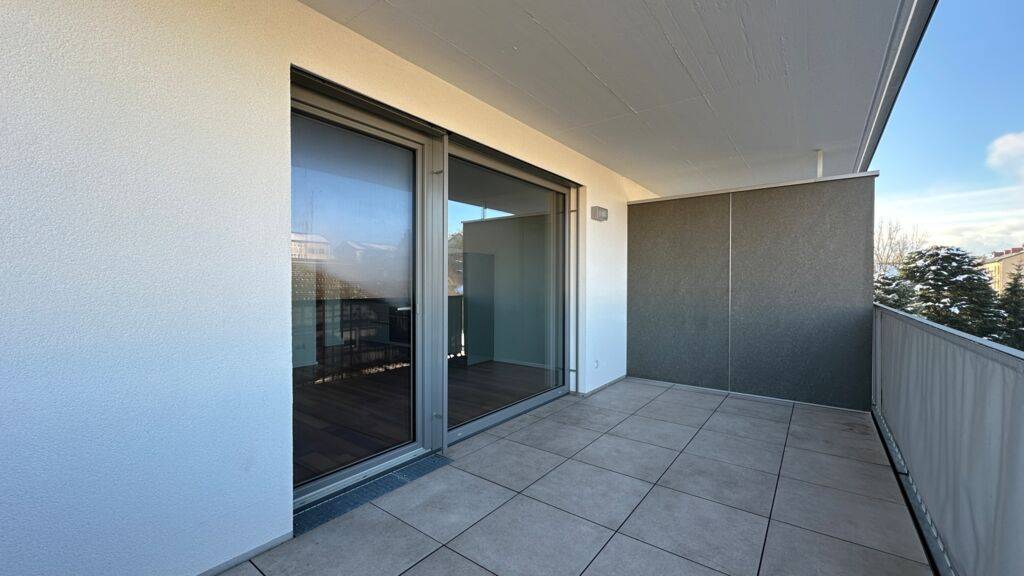 2-Zimmer-Wohnung mit Westterrasse und Carport am Fuße des Spitalbergs.