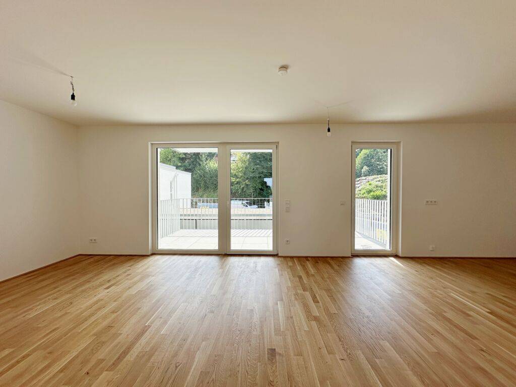 IMMERGRÜN. 3-Zimmer Wohnung mit Balkon und Tiefgaragenstellplatz. Verfügbar ab 01.10.2026