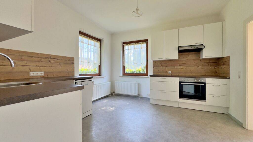 Charmante 2,5-Zimmer-Wohnung mit Gartenmitbenutzung am Kreuzbergl.